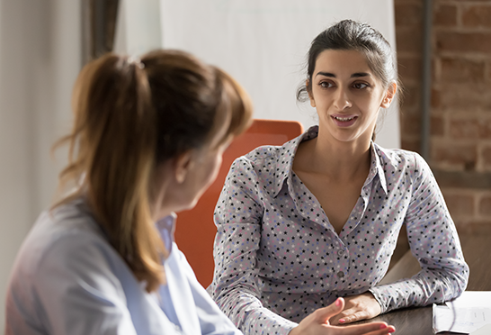 A lawyer talking to her client